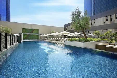 استوديو  للايجار في الخليج التجاري، دبي - damac-maison-cour-jardin. jpg
