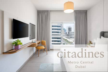شقة فندقية 1 غرفة نوم للايجار في برشا هايتس (تيكوم)، دبي - Premier 1BR -Bedroom 1. jpg