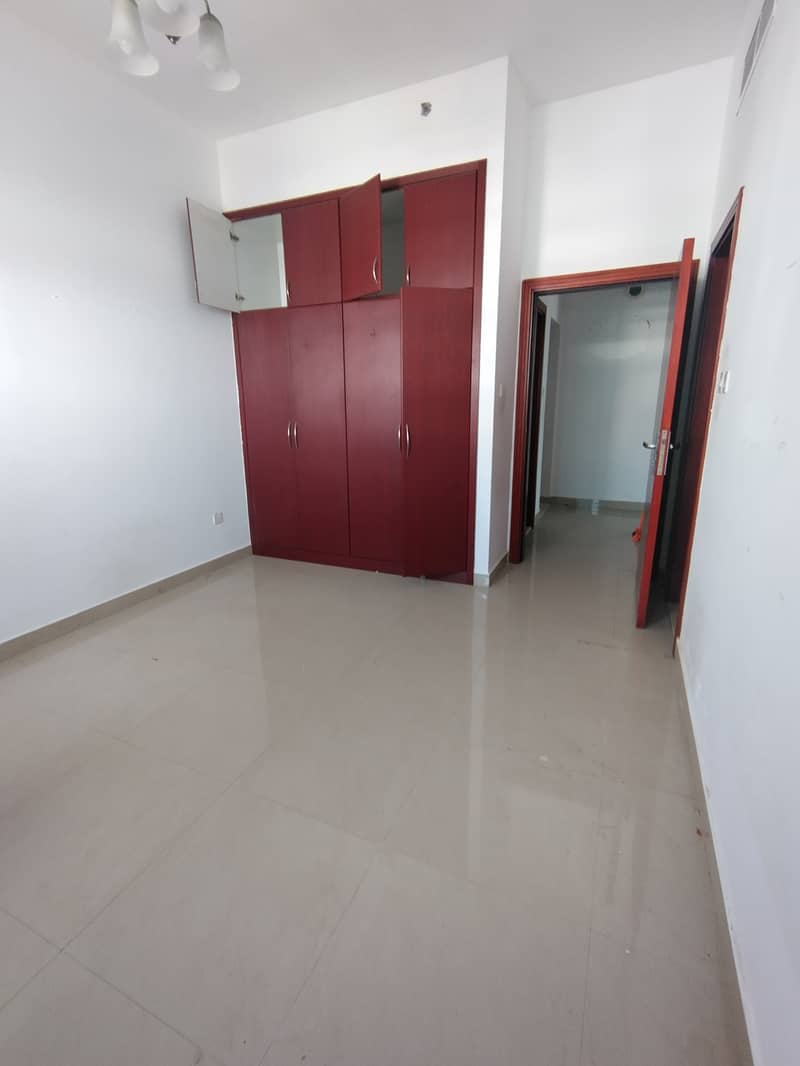 1 bhk available good for family sharing allowed near Al muteena Rood Brand New building Rent 53k with car parking available and also central gas available with balcony