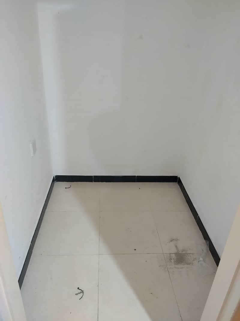 1 bhk available good for family sharing allowed near Al muteena Rood Brand New building Rent 53k with car parking available and also central gas available with balcony