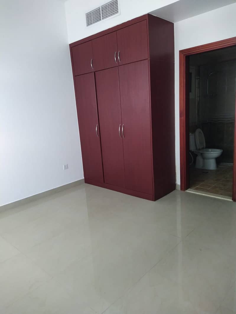 1 bhk available good for family sharing allowed near Al muteena Rood Brand New building Rent 53k with car parking available and also central gas available with balcony