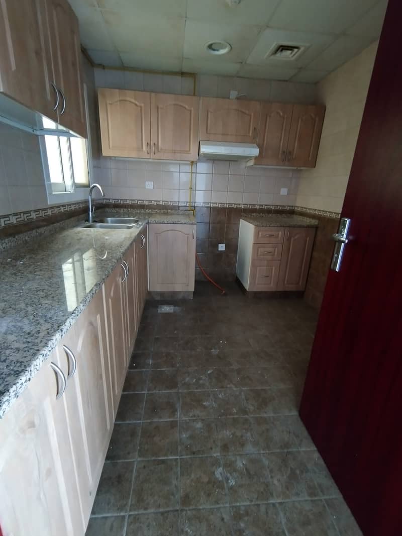 1 bhk available good for family sharing allowed near Al muteena Rood Brand New building Rent 53k with car parking available and also central gas available with balcony