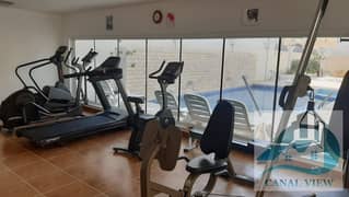 Lavish 4BR Villa with Shared Pool and Gym Covered Parking in KCA