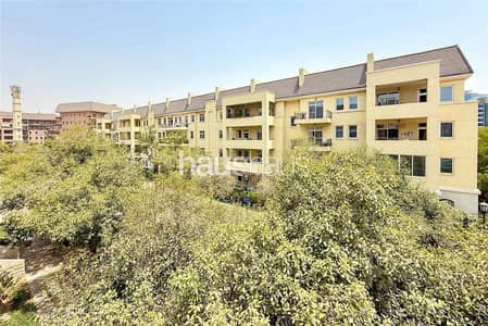 1 Bedroom Apartment for Sale in Motor City, Dubai - Rented | Upgraded | Fully Furnished | Corner Unit