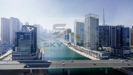 2 Cпальни Апартамент в аренду в Бизнес Бей, Дубай - 001 - Canal and Burj Khalifa View from Bedroom Balcony. JPG
