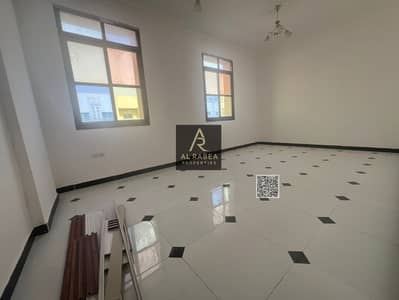 For annual rent in Ajman, second floor, in Rawda, 3 bedrooms, 2 halls, large areas