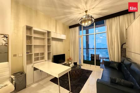 Studio for Rent in Business Bay, Dubai - Bright Unit Offering Space-Saving Foldable Bed