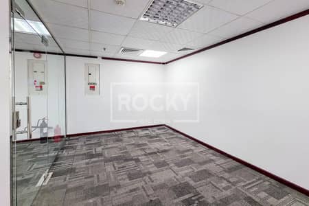 Office for Rent in Sheikh Zayed Road, Dubai - Partitioned Office | Near Metro | Prime location