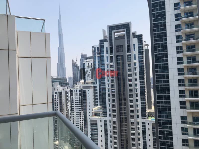 Unfurnished! 2 BR+Laundry Vacant Burj View