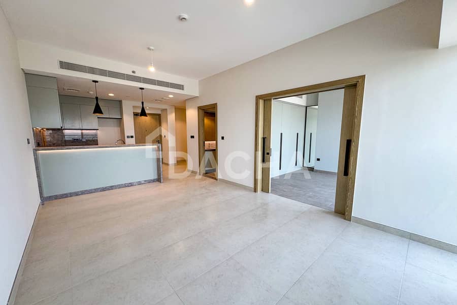 位于达马克山庄，高尔夫之门社区 1 卧室的公寓 1020000 AED - 12695877