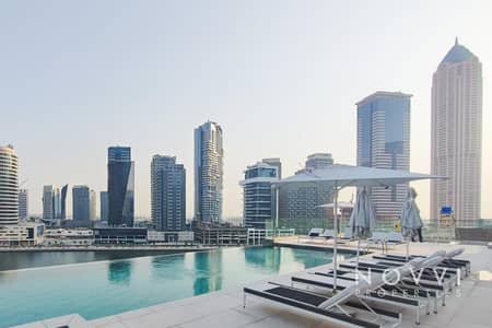 فلیٹ 2 غرفة نوم للايجار في الخليج التجاري، دبي - شقة في بنينسولا فايف،بينينسولا،الخليج التجاري 2 غرف 360000 درهم - 12696733