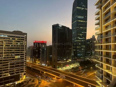 فلیٹ 2 غرفة نوم للايجار في الخليج التجاري، دبي - شقة في ذا باراغون باي IGO،الخليج التجاري 2 غرف 199000 درهم - 12698519