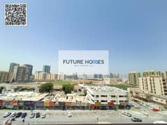 Stadium View 2 BHK Apartment for rent in Horizon Tower Ajman with Parking