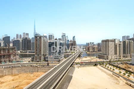 شقة 1 غرفة نوم للايجار في الخليج التجاري، دبي - شقة في ذا باراغون باي IGO،الخليج التجاري 1 غرفة 130000 درهم - 12706396