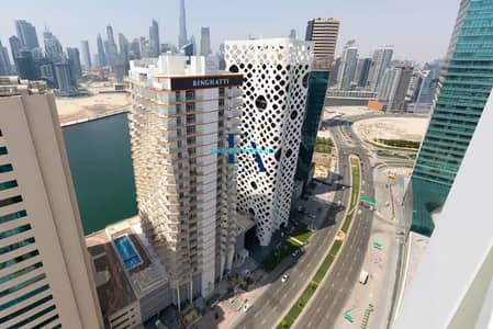 استوديو  للبيع في الخليج التجاري، دبي - شقة في ميلينيوم بن غاطي ريزيدنسز،الخليج التجاري 950000 درهم - 12718458