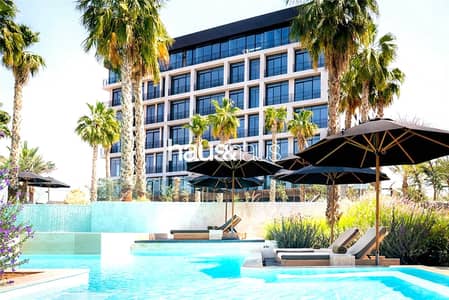 2 Bedroom Flat for Sale in Living Legends, Dubai - Views Over Pool and Lush Greenery
