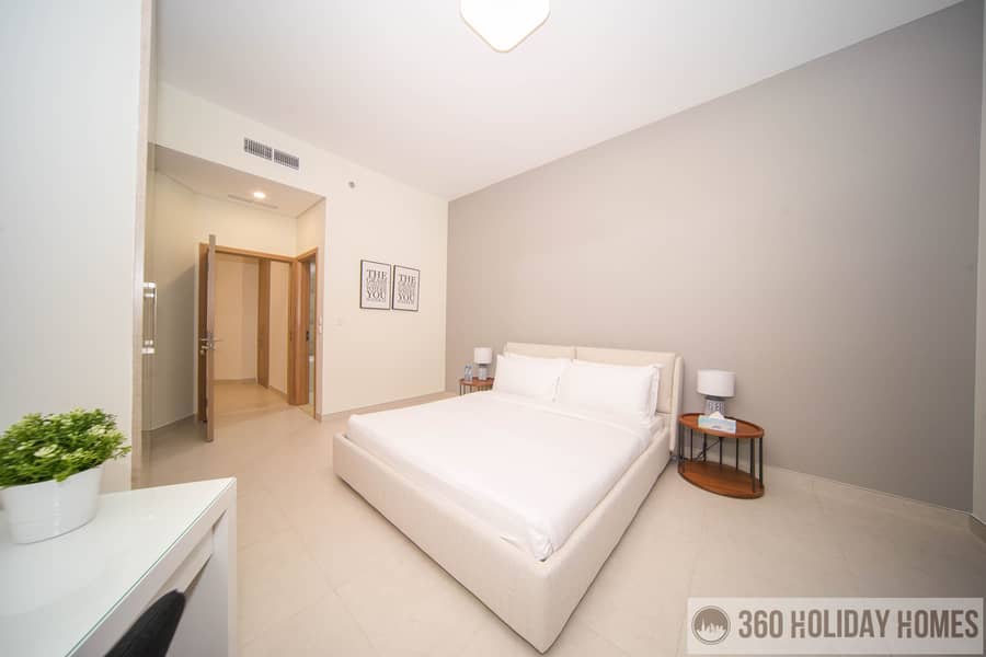 Chic 2BR with Balcony & Rooftop Pool Featuring Burj Khalifa Views - Image 6