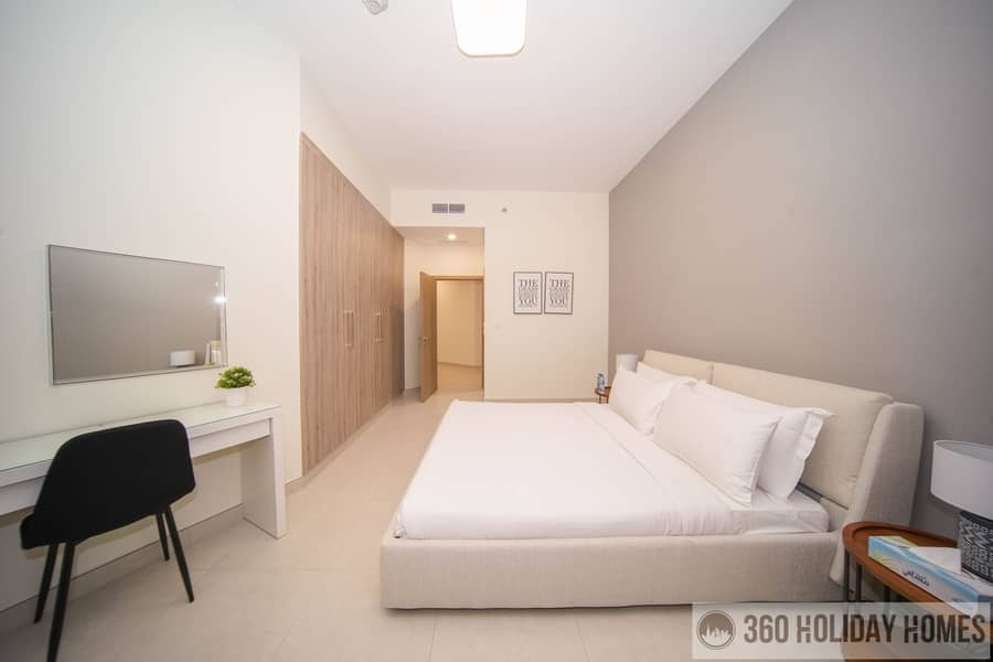 Chic 2BR with Balcony & Rooftop Pool Featuring Burj Khalifa Views - Image 7