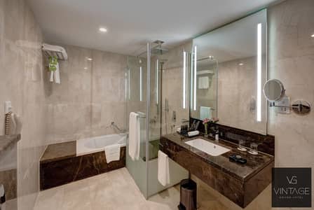 迪拜生产城(IMPZ)， 迪拜 2 卧室酒店式公寓待租 - Vintage Grand Hotel Dubai- Two Bedroom Bathroom 5. jpg