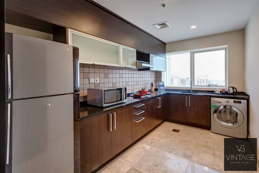 6 Vintage Grand Hotel Dubai - Two Bedroom closed kitchen (1). jpg