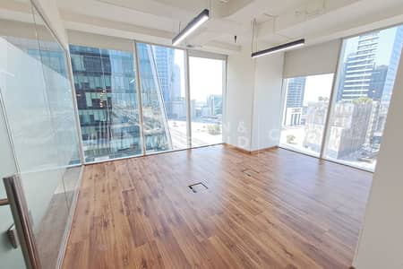Office for Sale in Business Bay, Dubai - Fully Fitted and Partitioned Office | 2 Parking
