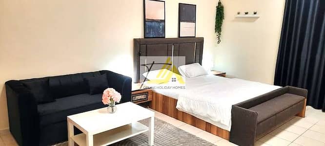Studio for Rent in International City, Dubai - 97b889b41b56462aa07e61697d4983ca-. jpg
