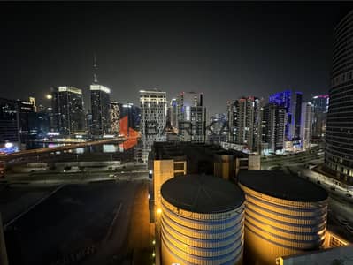 شقة 2 غرفة نوم للايجار في الخليج التجاري، دبي - 9c86015bb7154a8c8706559bd5dff586. jpg
