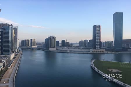 商业湾， 迪拜 1 卧室单位待售 - 位于商业湾，达马克海湾之畔大厦 1 卧室的公寓 1575000 AED - 12352307