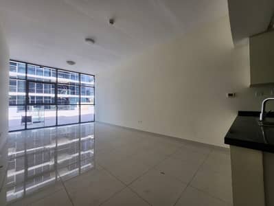 2 Bedroom Apartment for Sale in DAMAC Hills, Dubai - Kitchen living 1. jpeg
