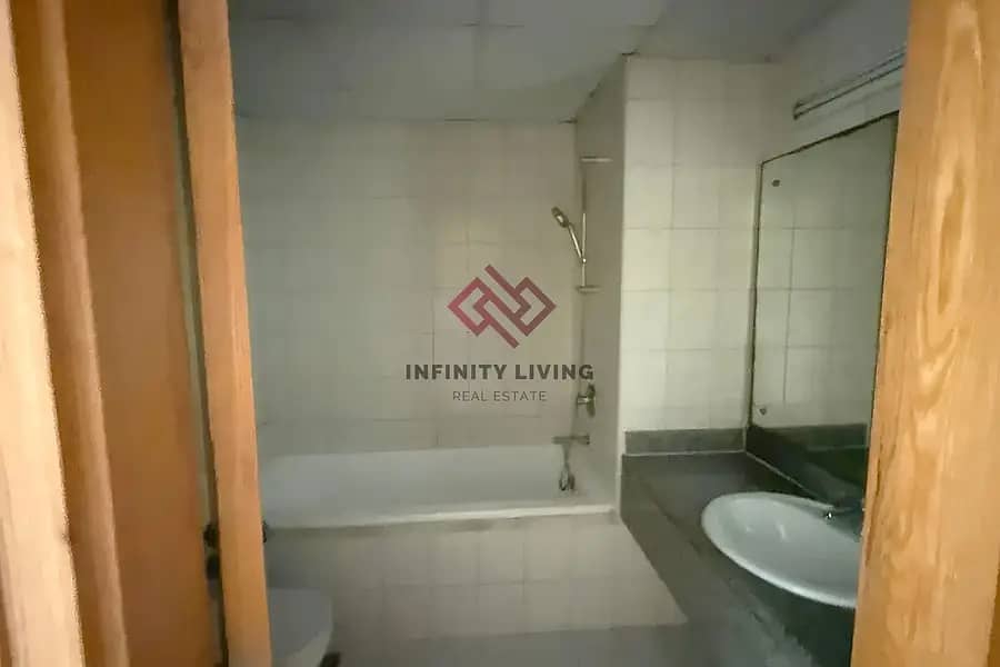 Spacious 1-Bedroom Apartment for Sale | Prime Location Near The Gardens Metro Station | High ROI | Excellent Investment Opportunity