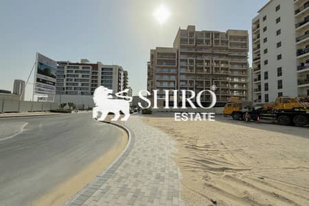 Plot for Sale in Majan, Dubai - Residential Plot | G + 7 | Main Road