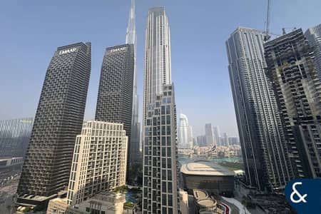 شقة 2 غرفة نوم للايجار في وسط مدينة دبي، دبي - شقة في ذا لوفتس ويست،ذا لوفتس،وسط مدينة دبي 2 غرف 175000 درهم - 12834938