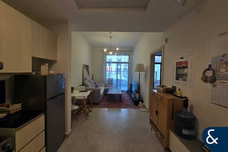 1 Bedroom Flat for Rent in Jumeirah Village Circle (JVC), Dubai - Pool Facing | Furnished | Ready to move in