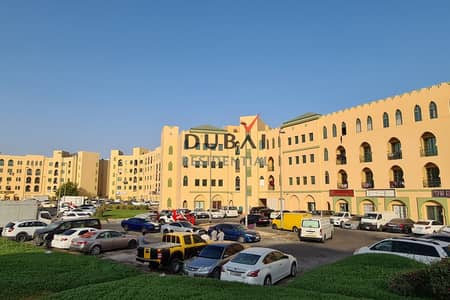 محل تجاري  للايجار في المدينة العالمية، دبي - J05 (3). jpg