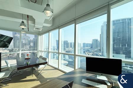 Office for Rent in Business Bay, Dubai - Full Canal Views | Corner Unit | Furnished