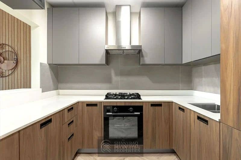 Live Elevated: Stunning High Floor Apartment in JVC with Pool & Burj Al Arab Views! - Image 18