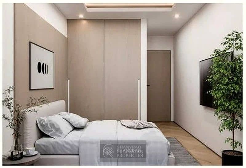 Live Elevated: Stunning High Floor Apartment in JVC with Pool & Burj Al Arab Views! - Image 12