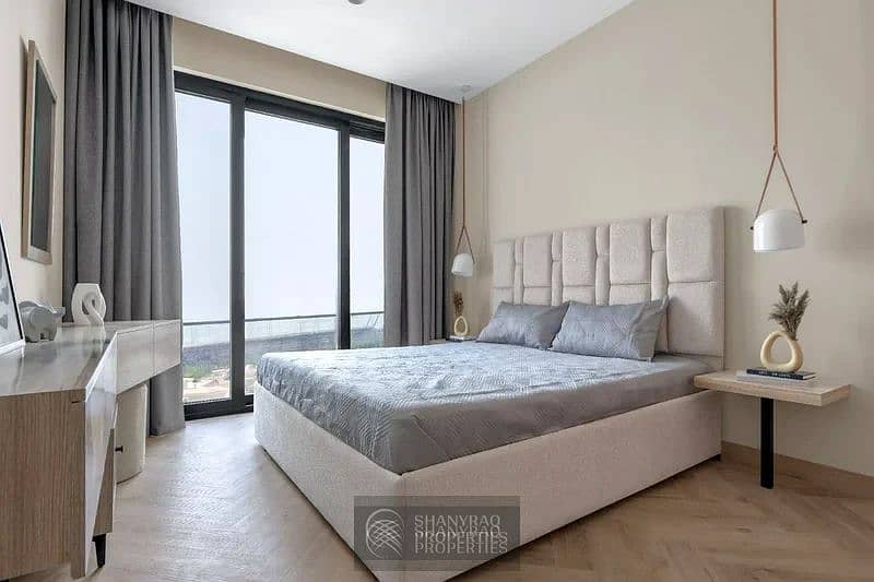 Live Elevated: Stunning High Floor Apartment in JVC with Pool & Burj Al Arab Views!