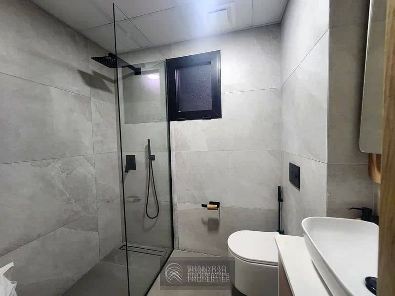 Live Elevated: Stunning High Floor Apartment in JVC with Pool & Burj Al Arab Views! - Image 23