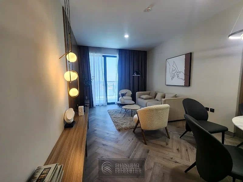 Live Elevated: Stunning High Floor Apartment in JVC with Pool & Burj Al Arab Views! - Image 7