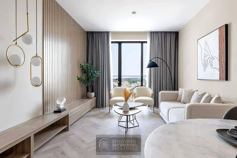 Live Elevated: Stunning High Floor Apartment in JVC with Pool & Burj Al Arab Views!