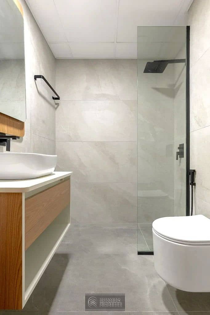 Live Elevated: Stunning High Floor Apartment in JVC with Pool & Burj Al Arab Views! - Image 21