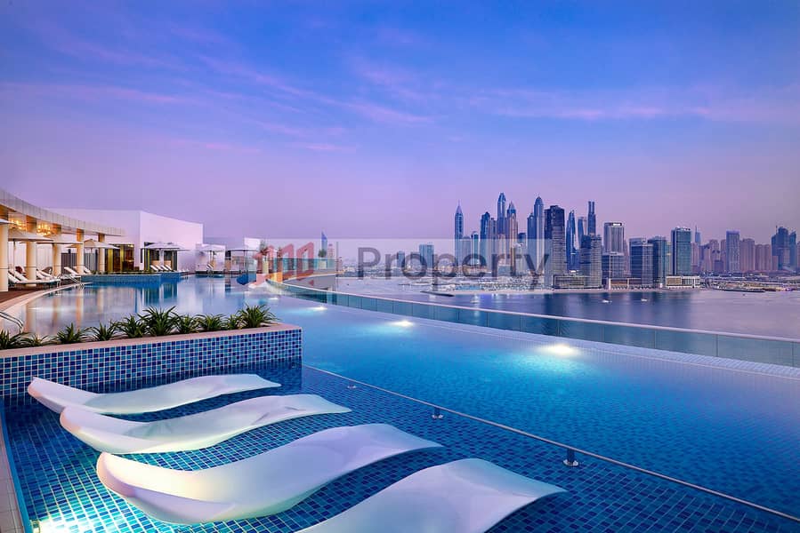6 NH_Collection_Dubai_The_Palm_Pool View_Evening. jpg