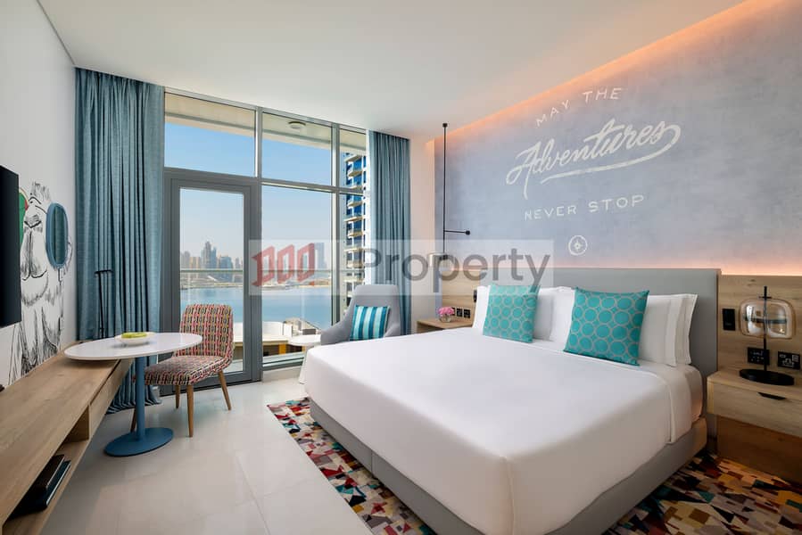 9 NH_Collection_Dubai_The_Palm_Premium_Sea_View_Room_Bedroom. jpg
