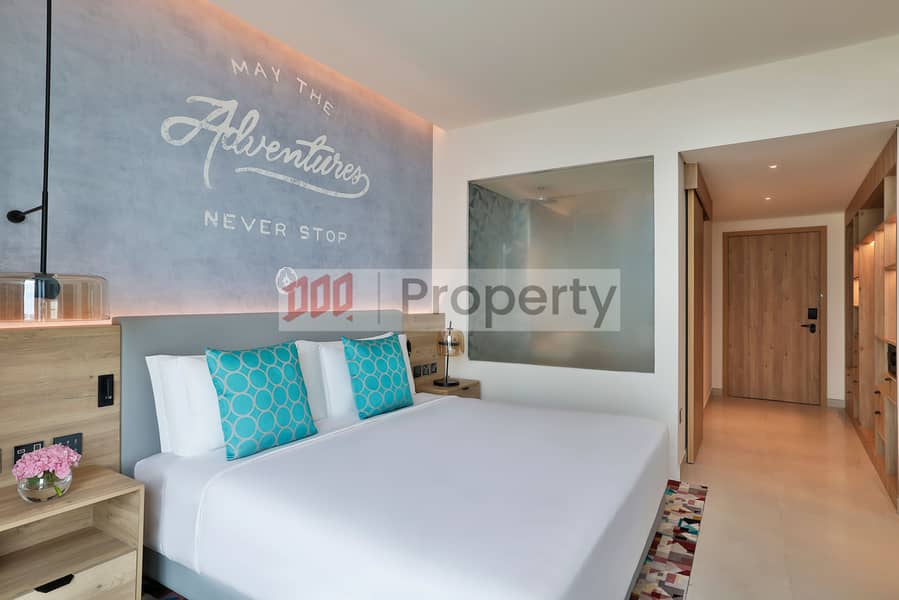 11 NH_Collection_Dubai_The_Palm_Premium_Sea_View_Room_Bedroom_2. jpg