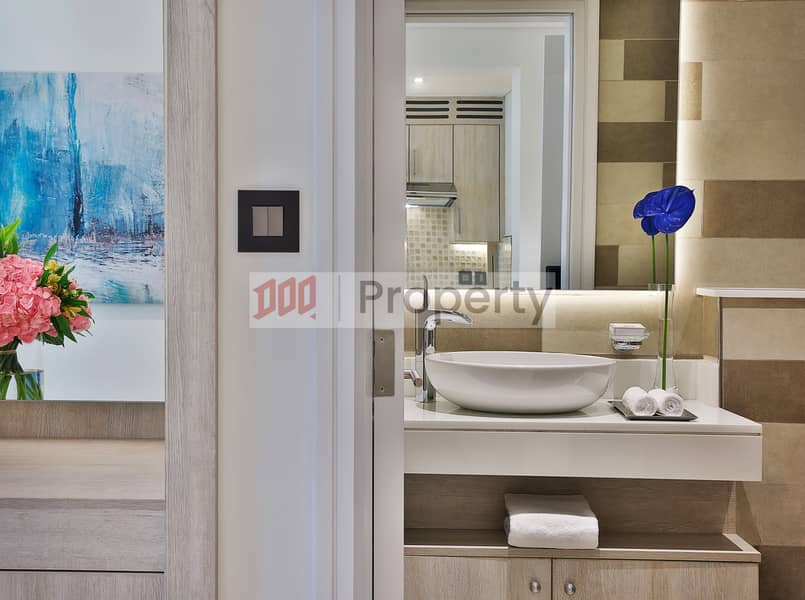 12 NH_Collection_Dubai_The_Palm_Superior_One_Bedroom_Apartment_Guest_Bathroom. jpg