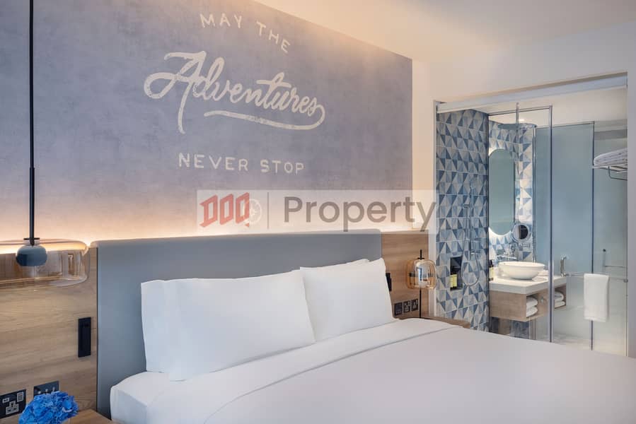 14 NH_Collection_Dubai_The_Palm_Standard_Room_Bedroom_4. jpeg