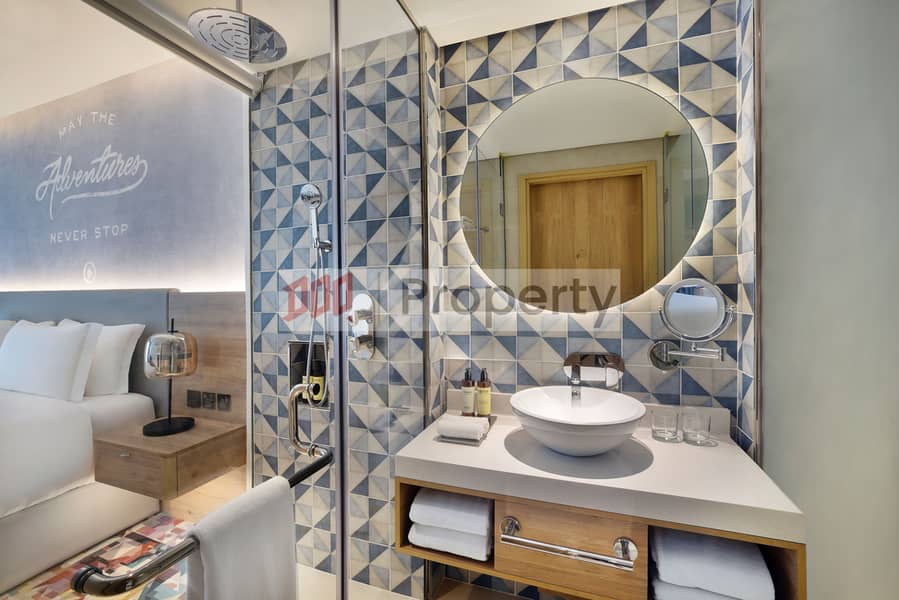15 NH_Collection_Dubai_The_Palm_Superior_Room_Bathroom_View. jpeg