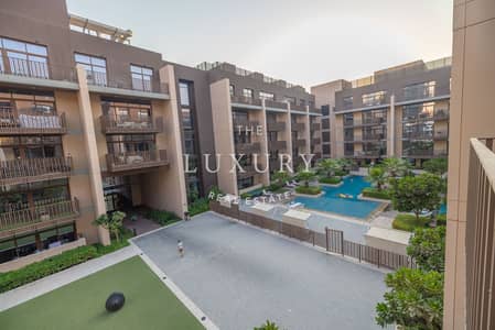 فلیٹ 1 غرفة نوم للايجار في قرية جميرا الدائرية، دبي - Pool_View___Modern_Quality___Fitted_Kitchen-14. jpg