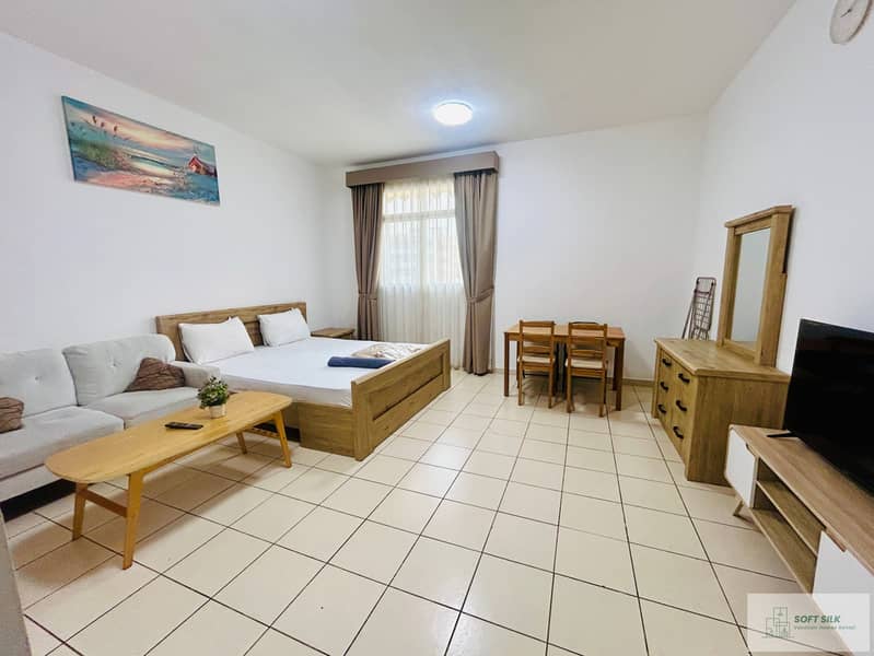 Close to Dragon mart | Spacious Studio | New and Clean